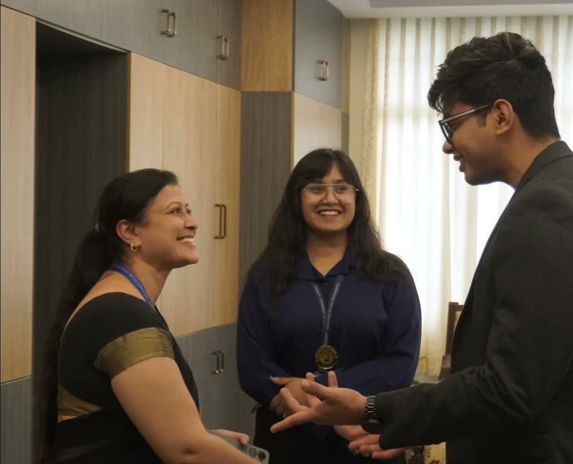 Raman with educators after a session